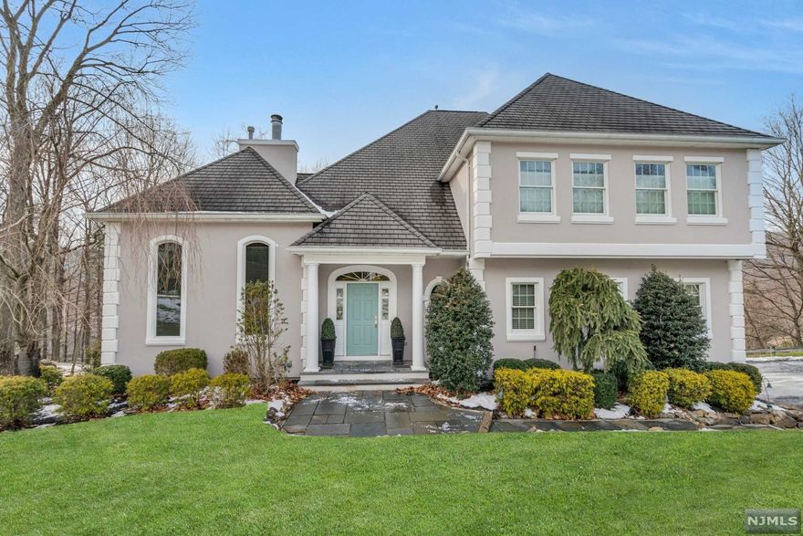 1st time offered in desirable Darlington Village. Private setting with mountain and sunset views, beautiful custom appointments, approx. 3600+ SF on two floors with 9' ceilings on 1st floor and approx. 12' ceilings in Living Room and Great Room with dual fireplace. Perfect floor plan for today's casual living w/ a private office, den, large Dining Room and bright kitchen with seated island and breakfast area with exit to back deck facing the Ramapo mountains. Three large bedrooms upstairs includes the sprawling primary suite with two walk-in closets and bath with jacuzzi tub and separate shower. Walk out finished lower level has your own professional wine cellar. Oversized 3 car garage with epoxy floor, tons of closets and storage, Swedish Kahres hardwood floors on 1st level & more. Enjoy the fabulous community amenities with gorgeous pool, clubhouse, gym, tennis, bocci ball and basketball. Easy living in luxurious neighborhood. HOA Dues apply.