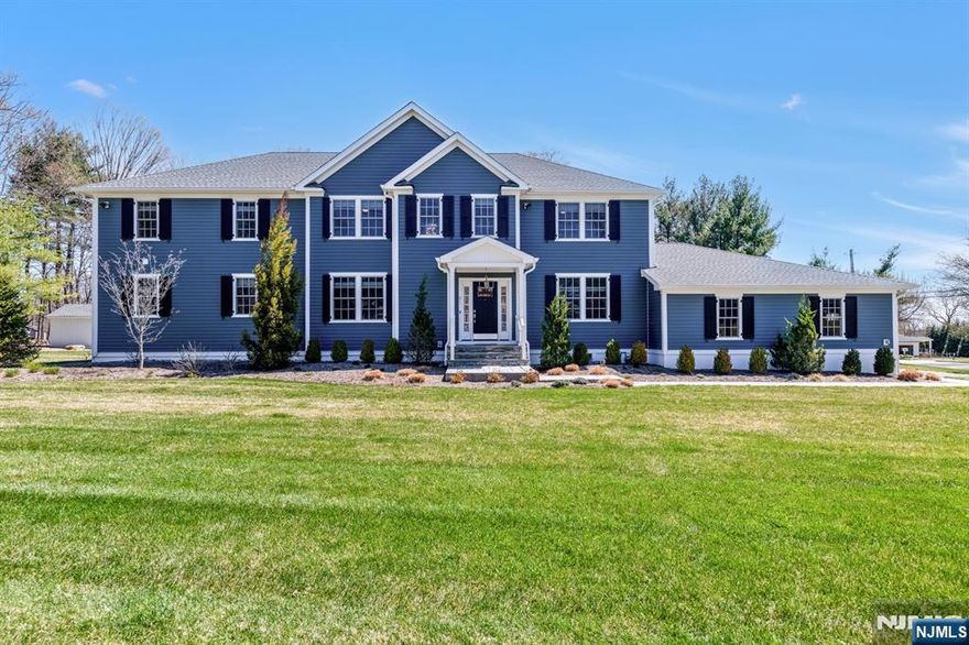 Exceptional colonial built in 2022, nestled on a builderâ€™s acre in the ultra-desirable Scotch Hill section of Mahwah. Offering 5 spacious bedrooms & 4.5 bathrooms. Designed for comfort & versatility with TWO luxurious primary suites. The 1st floor suite is ideal for multi-generational living, complete with a sitting area, large WIC & a full bath. The 2nd floor primary suite is an expansive retreat with Dual WICs & a spa-like bath. The gourmet kitchen is a chefâ€™s dream with a massive center island, seamlessly flowing into the great room with a gas FP framed with built-ins. Enjoy the outdoors year-round on the covered deck overlooking a large, level backyard, deal for entertaining, play, or even a future pool. Impeccable details throughout like gleaming hardwood floors, elegant crown molding, designer tilework & curated finishes in every space. Rare to find a 3 car attached garage. Do not miss this stunning home in beautiful Mahwah with excellent schools and a wonderful community.