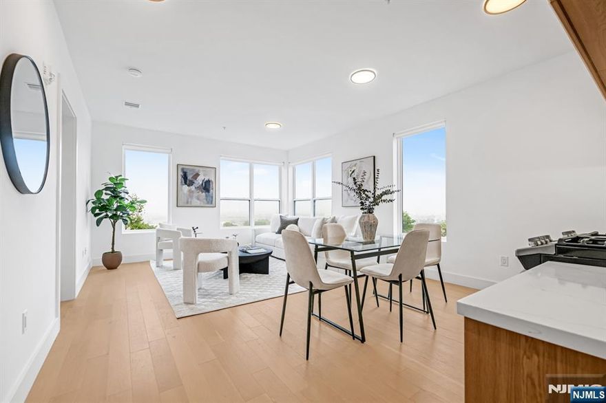 1 YEAR HOA COVERED!- LIMITED TIME OFFER. Introducing Tailor House at 38 Union City, Hudson Countyâ€™s newest boutique luxury condominium. This intimate elevator building offers just 48 thoughtfully designed residences, combining privacy, sophistication, and urban convenienceâ€”all just 15 minutes from NYC by bus. Tailor House redefines modern living with oversized 1- and 2-bedroom homes featuring open-concept layouts, soaring 9â€“10 ft ceilings, and generously sized bedrooms. Sleek kitchens are outfitted with waterfall quartz countertops, European-style two-tone oak cabinetry, GE Professional Series appliances, and select units include contemporary islands. Bathrooms evoke a spa-like feel with floor-to-ceiling porcelain tile, glass-enclosed showers, and marble-topped vanities. Residents enjoy upscale amenities including a fully equipped fitness center, stylish lobby, landscaped garden terrace, and smart security with Swiftlane intercoms. Assigned parking is included, with additional spaces available for purchase, and a 5-year tax abatement adds even more value. Nestled in the heart of historic Union City, Tailor House offers a refined lifestyle where modern design meets everyday convenience.