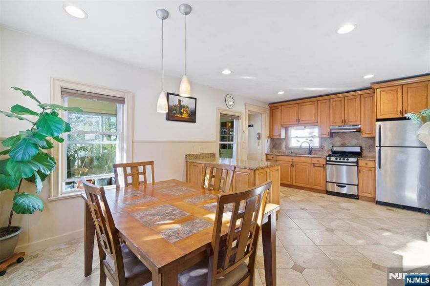 Lives Like a 3-Bedroom! This 2-bed, 2-bath gem in the heart of Leonia truly offers the space and versatility of a 3-bedroom home. The main level boasts stunning granite floors, a bright and airy living room, and a chefâ€™s kitchen with granite countertops, stainless steel appliances, and a central island. Enjoy year-round comfort in the indoor patio, which leads to your private backyard oasisâ€”perfect for relaxation or entertaining. Upstairs, two generously sized bedrooms feature ample closet space, while the top-floor bonus room, complete with a walk-in closet, functions perfectly as a 3rd bedroom. The semi-finished basement includes utilities and a 2-month-old hot water heater. With central HVAC, parking for three cars, and a prime location just steps from the 158 bus, elementary school, and Highwood Hills Park, this home is a must-see!