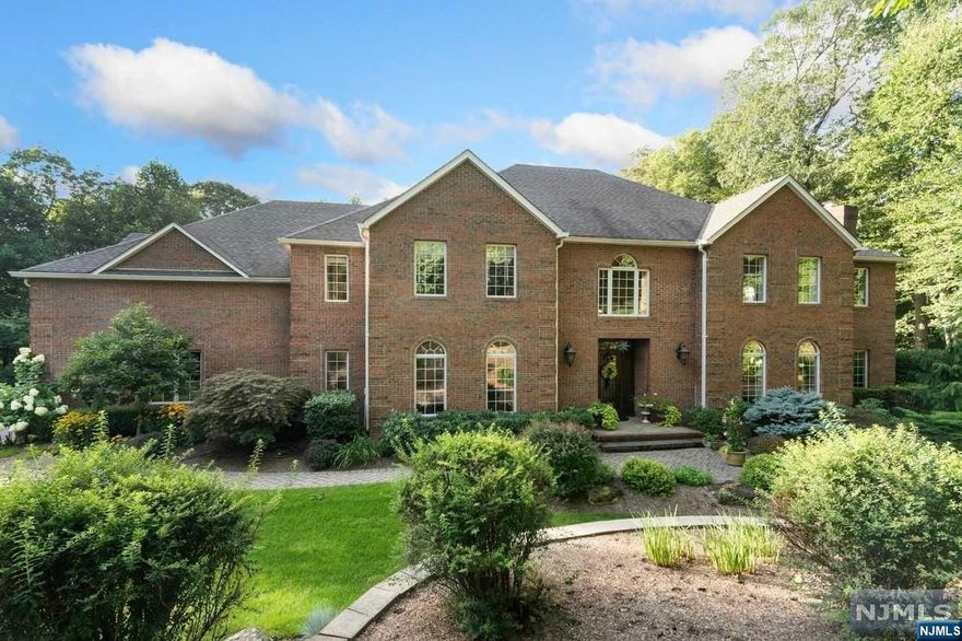 Exceptional, Magnificent and first-class are just a few adjectives that can be used to describe this stately colonial. With 4 bedrooms and 4 full baths & 1 half bath it will not disappoint. Move right in and enjoy since every room has been completed, painted, updated and loved. From the quiet cul-de-sac location though the custom front doors you'll find an updated kitchen with all new appliances, quartz countertops and tile floors. A fully finished basement await you with bar, wine cellar, media room, workout space, a full bath and sauna as well as ample space for storage complete the downstairs. You'll find yourseld drawn to the private backyard oasis that has multi-level paver patios with a waterfall, stone fire pit that will entertain the finest guests. The deck off the kitchen over looking the waterfall has newly updated composite decking and boosts the most beautiful flowers, with immaculate landscaping that surrounds the entire house.