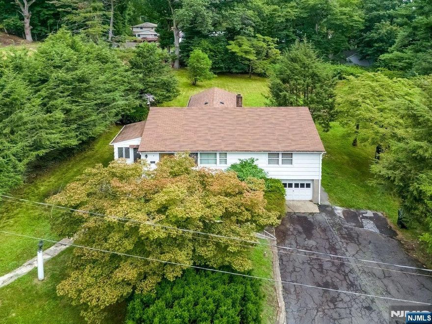 Schubert Lane has been completely repaved. Arguably one of the most private streets in highly desired Paramus NJ. Rare opportunity to own a 1/2-acre lot (approx. 100x200) in the heart of Bergen County, complete with signed and sealed architectural drawings to build a one-of-a-kind, 8,227 SQ FT custom home that checks all the boxes. Choose to design a home to your liking or move forward with the existing shovel-ready plans, included in the sale. Contact listing agent for details about the drawings. Amazing location - Near shopping/restaurants, parks, public transportation, major highways (route 4, 17, GSP), and schools. 4 Schubert Lane is on a 21,212 SQ FT lot and has a 1,200 SQ FT house on it. Also available for sale is 6 Schubert Lane which is a 21,578 SQ FT lot (just land, no structure). Asking $899,00 for each lot.