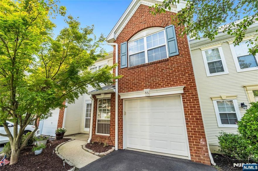 Beautifully updated 3BR/2.5BA townhouse in the desirable Hunting Hills community of Montville Township! This home features an open floor plan with hardwood floors on the main level. The kitchen opens to a fenced private patio, perfect for entertaining, and the two-story family room with a cozy fireplace is located right off the kitchen. The spacious primary suite boasts a cathedral ceiling, two walk-in closets, and a renovated bathroom with an oversized shower and double sinks. Additional highlights include a renovated 2nd full bathroom with modern finishes. Conveniently located near major highways, the Towaco NJ Transit station, and top-rated schoolsâ€”all within a well-maintained community with low monthly HOA fees.
