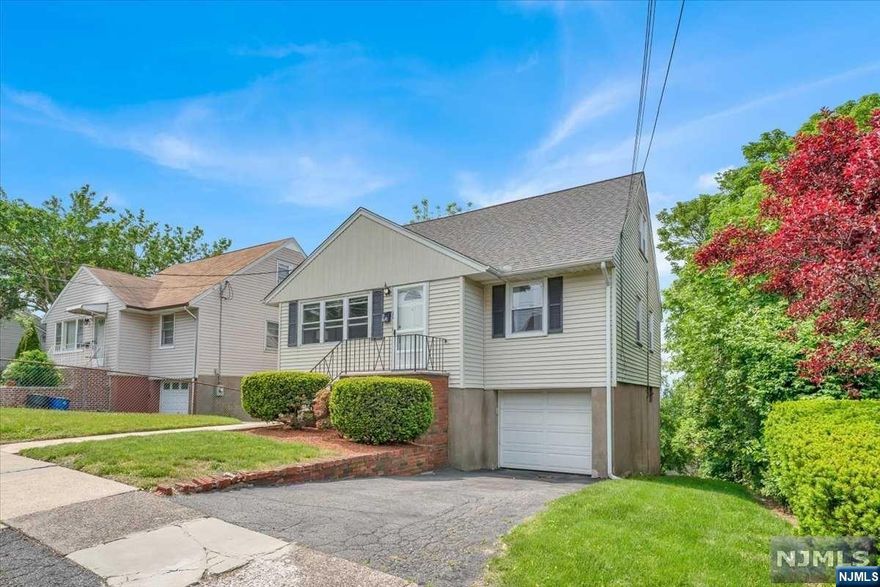 Amazing opportunity to move into this 4 bed, 1.5 bath cape in the desirable north end section of North Bergen, conveniently located a few blocks from the bus to NYC, local restaurants, shopping, schools and parks. The main level boasts a living room, an eat-in-kitchen, the primary suite, an additional bedroom and 1 full bathroom. The 2nd floor consists of 2 more spacious bedrooms and 1 half bath. The fully finished basement comes with a size-able family room, bar area, convenience summer kitchen, laundry area, with direct access to the garage and backyard. LOW Taxes ($7,866)! Don't miss this opportunity! Come and see it for yourself today!