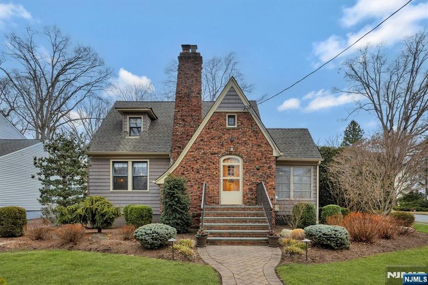 Step into a meticulously updated Tudor blending old-world charm & modern convenience. Whether you seek a magazine-worthy townhouse alternative, a downsizerâ€™s dream, or a starter home with room to growâ€”this gem delivers! Inside, enjoy newly refinished hardwood floors, New AC, custom window treatments, and a walk-in closet with a window in the primary suite. The renovated kitchen boasts quartz counters, Jenn-Air appliances, under-cabinet lighting, and a 3-stage water filtration system. The main bathâ€™s heated floors add a touch of luxury. Outside, a fully fenced backyard with a patio, fire pit & lush landscaping creates a private retreat. Smart home featuresâ€”Lutron dimmers, Google cameras, Nest, and a Rainbird sprinkler systemâ€”are all phone-controlled. While currently a 2-bedroom, thereâ€™s expansion potential over the garage. Steps from Starbucks, bakeries, restaurants, The Town Center, NYC transit & top schoolsâ€”this is a rare find! Must See!