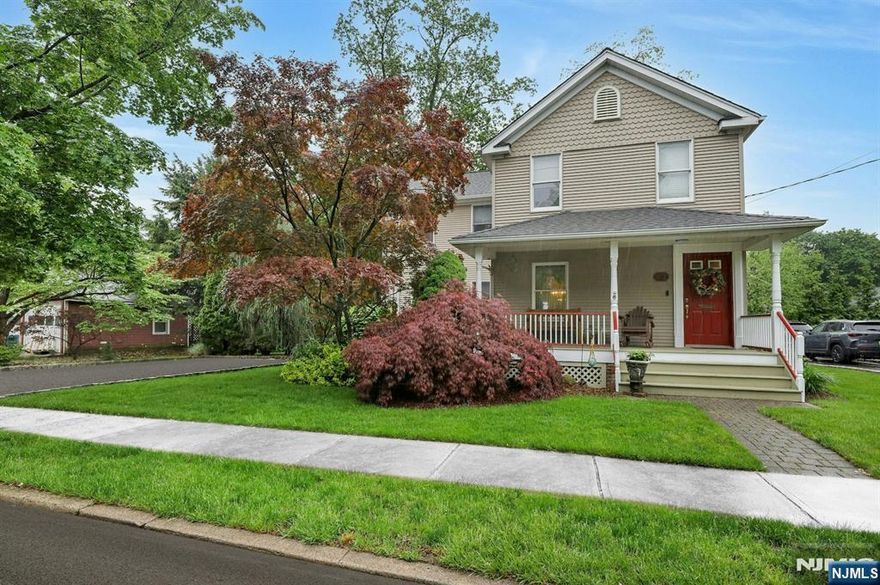 This is the one youâ€™ve been waiting for! Stunning 3 bedroom, 2.5 bath colonial home located just minutes from Ridgewood's parks, July 4th fireworks, pool and vibrant downtown. The home's gracious curb appeal and inviting front porch creates a warm and welcoming first impression. This home offers a combination of old world charm with the perfect blend of modern updates and functionality. First floor features a charming sun filled formal living room, formal dining room with bay window overlooking professionally landscaped rear yard. Chefs will,appreciate the updated kitchen with solid wood cabinetry, stone counters and stainless steel appliances. Spacious family room boasts wood burning fireplace and convenient guest powder room. Second floor offers a beautiful primary bedroom with two closets and private bath. Two comfortably sized bedrooms, full bath and laundry complete this floor. Storage can be found in the unfinished attic (accessible by pull-down stairs), basement and bonus storage room accessible from rear yard. Welcome home!