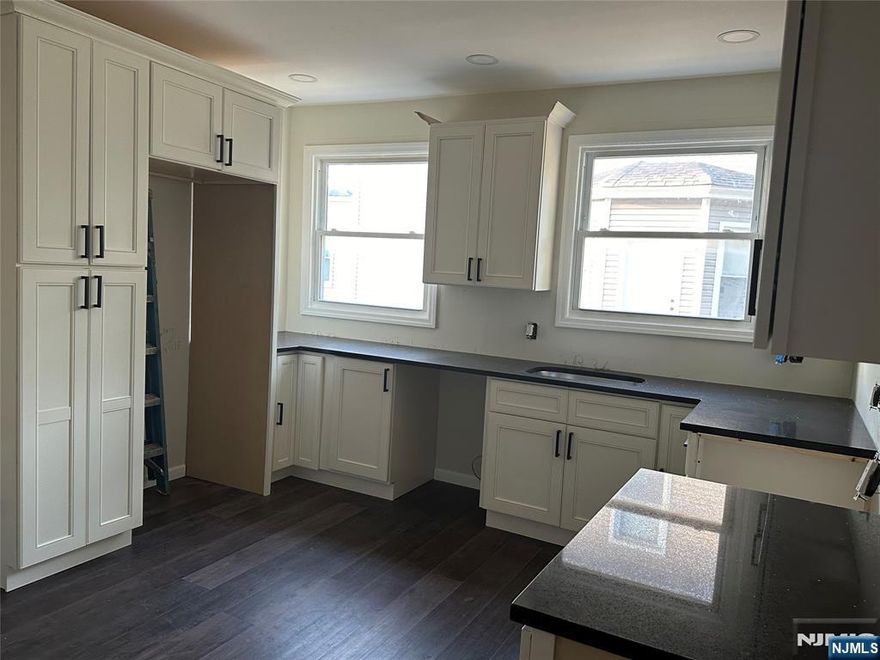 This stunning 3-bedroom apartment boasts a bonus room perfect for a home office, gym, or playroom. Featuring 1.5 beautifully updated bathrooms, the space is ideal for modern living. The apartment has been recently renovated and is equipped with brand new, state-of-the-art appliances. You'll love the elegance and convenience of the new luxury cabinets in the kitchen, providing ample storage and a sleek, contemporary look. Don't miss out on this perfect blend of comfort, style, and functionality.