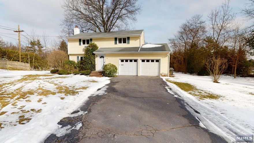 ENTER THIS SPACIOUS 4 BEDROOM 2 FULL BATH COLONIAL SITUATED AT THE END OF A PRIVATE CUL-DE-SAC. HUGE 2-CAR GARAGE WITH PLENTY OF STORAGE. CLOSE TO SCHOOLS, SHOPPING, AND GARDEN STATE PARKWAY FOR QUICK COMMUTE!
