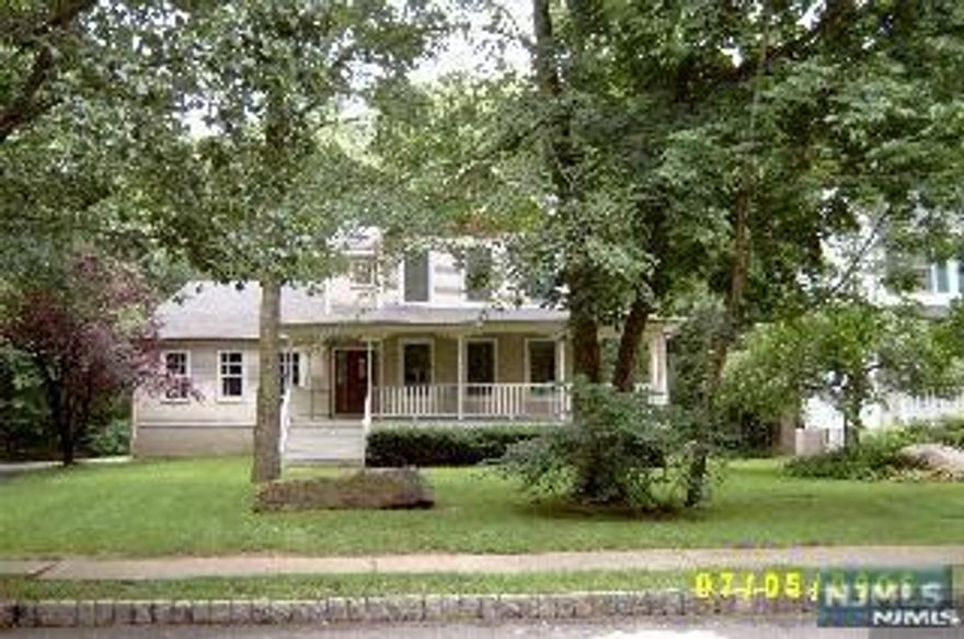 This well-maintained home offers 10 rooms of versatile living space including a first-floor bedroom and full bath, formal living and dining rooms, family room, and eat-in kitchen. The second level features a large primary suite with private bath and Jacuzzi plus four additional bedrooms and a full bath. Highlights include central air, gas heat, gas fireplace, full basement with laundry and storage, two-car attached garage, and yard use. Conveniently located near schools, shopping, transportation, and places of worship. A rare opportunity for space and flexibility in Waldwick.(UPGRADES ON THE WAY-NEW ROOF-NEW DRIVWAY-REFINISHING FLOORS-PAINTING)