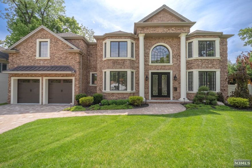 Please submit highest best and final by Thursday June 16Th at 9 am .Custom home finished to an exceptional level of craftmanship, with custom trim, high end bathrooms, and designer touches throughout. 1 FL foyer opens to a dining room and a 2-story family room both with coffered ceilings, a gourmet kitchen with custom cabinetry and high end Thermador appliances. a guest suite, office, mudroom and laundry. 2 FL boasts an elegant master bedroom, a spa-like master bath with walk in shower and Kohler bath and fittings, two exquisite walk in closets with custom shelving and millwork, plus 3 more bedrooms with 2 Baths. Basement is fully finished with a large recreation room, bar, gym, bedroom, full bath and a movie Theatre. Outside is well-manicured, with a lovely patio. The house is a equipped with a security system, a full home generator and a smart home technology. Located close to shops, restaurants, great schools, transportation to NYC, parks and low Paramus property tax
