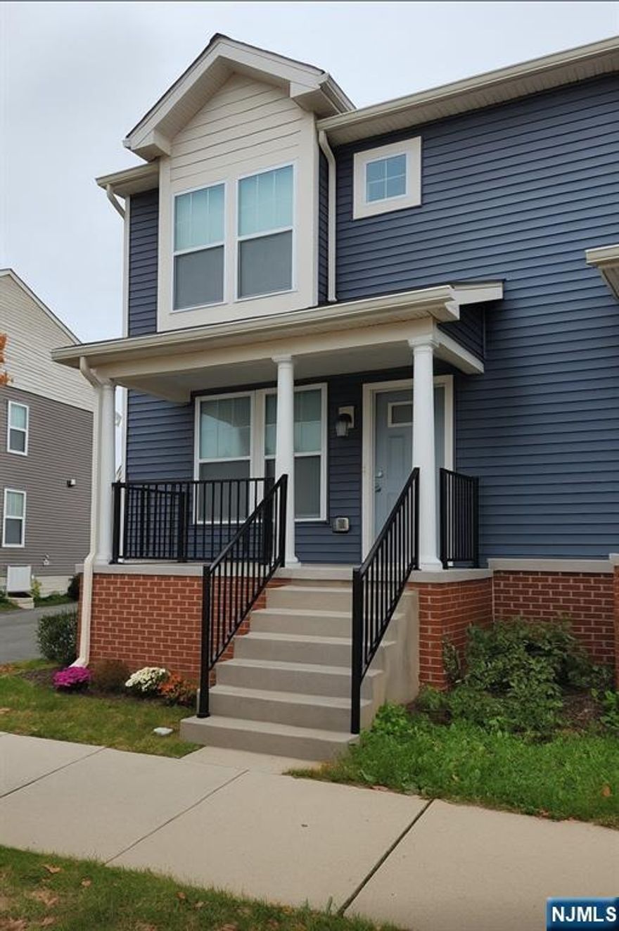 Welcome to Hamilton Ridge! Spacious 4BR/3.5BA townhouse with private 1BR in-law suite, updated kitchen w/quartz, laundry, storage, yard & off-street parking. New development near NYC & major highways. A must see!