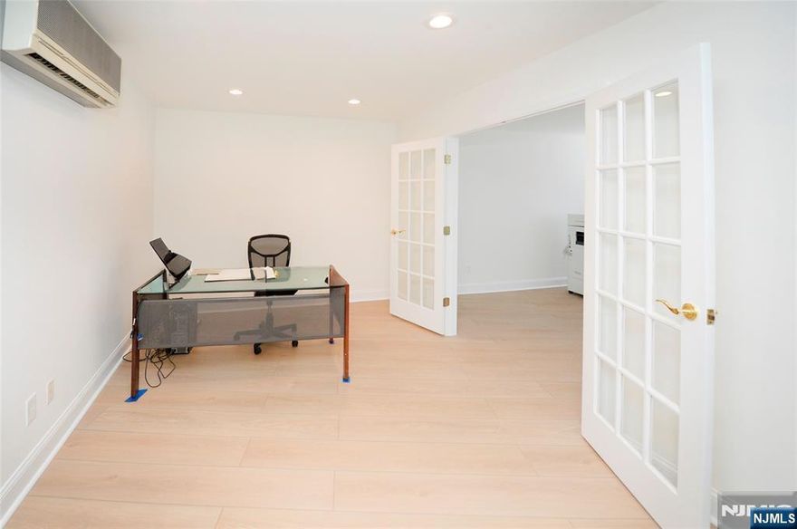 Exceptional commercial opportunity at the Blair House in Hackensack! This first-floor Unit LE offers approximately 900 sq. ft. of versatile office space, ideal for medical, legal, accounting, therapy, or other professional practices. The smart, functional layout features a spacious open bullpen/work area, two private offices including one with a convenient in-office shower and a private bathroom, providing flexibility for a variety of business needs. Additional highlights include dedicated parking spaces and access to a well-maintained, professional building environment that creates a welcoming experience for both clients and staff. Strategically located with easy access to major highways, public transportation, and nearby amenities, this space offers the perfect balance of convenience, accessibility, and professional presence. HOA: $694/month + $32 special assessment. A fantastic opportunity to establish or grow your business in a highly desirable professional setting.