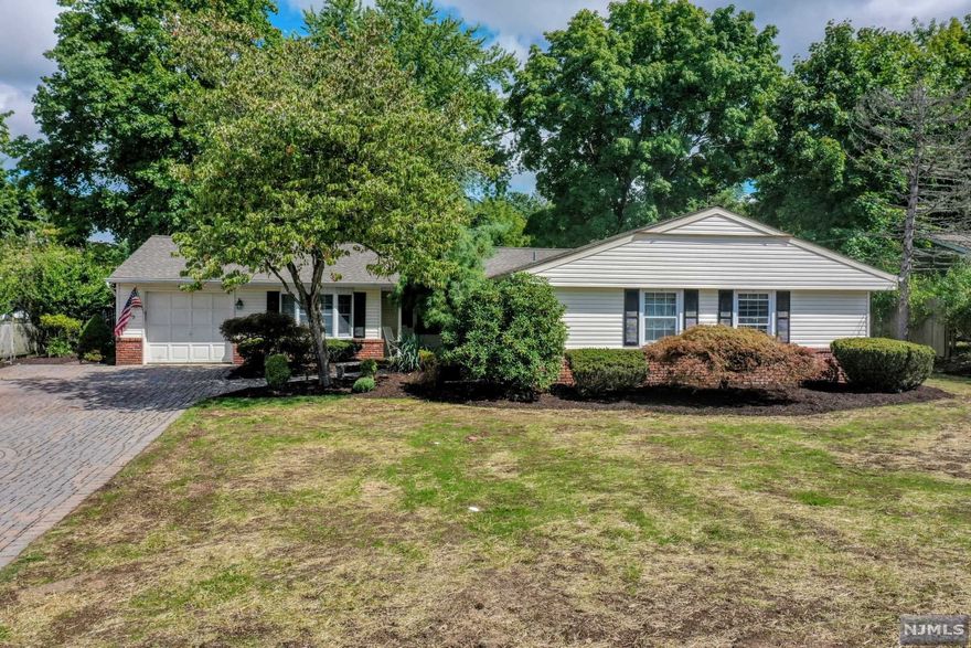 Come see this charming well maintained ranch located on a quiet street close to shopping and transportation, this home has a lot to offer. Modern eat-in kitchen with glass sliding doors to a newly painted deck with a patio. The living room/ dinning room have an open concept. 3 bedrooms and 2 baths. New tankless water heater and furnace, New septic system, new underground sprinkler system. A must see!!