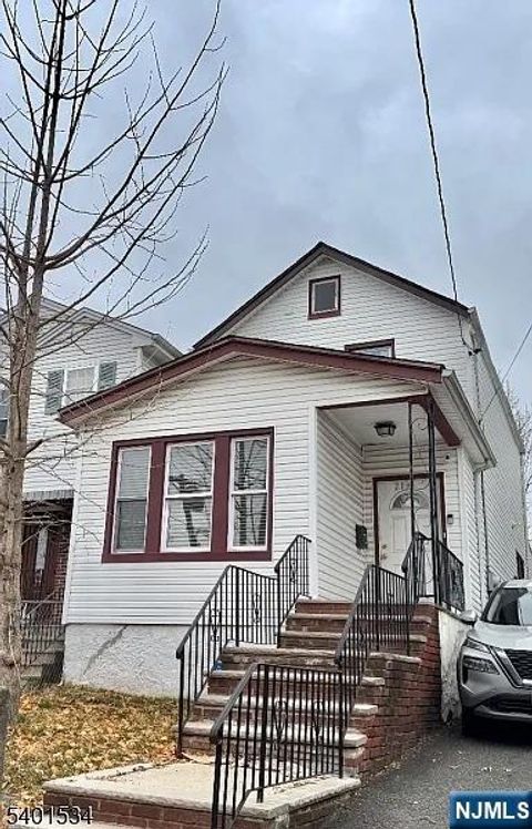 Photo of 219 Peshine Avenue, Newark, NJ 07108 (MLS # 25043557)