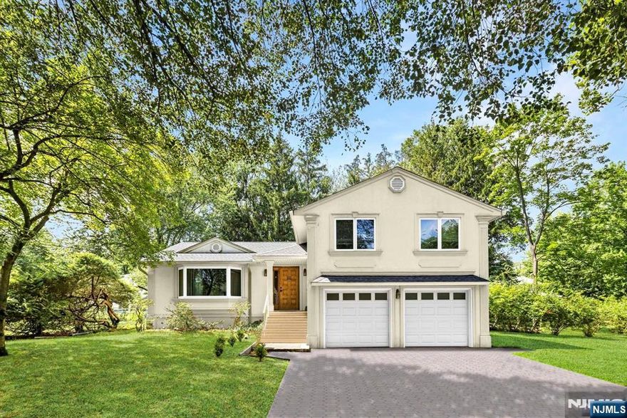 Welcome to this charming split-level home nestled in a peaceful cul-de-sac, perfectly complemented by the stunning view of a lush park just across the street. With three spacious bedrooms and two-and-a-half baths, this residence offers both comfort and convenience. The interior boasts a sense of space and light, making every room a joy to spend time in. The open layout lends itself to easy living, while the beautiful backyard provides a private oasis for relaxation and outdoor gatherings. Privacy is a given, allowing you to enjoy serene moments in your own slice of paradise. One of the remarkable features of this home is its fantastic location. An easy commute to New York City and close to top-rated schools. In addition, the home's location ensures that you're never far from a vibrant array of shops and restaurants, catering to all your needs and culinary desires. This split-level is a true gem! The tenant is responsible for the first $200 in repairs, lawn care, and snow removal.