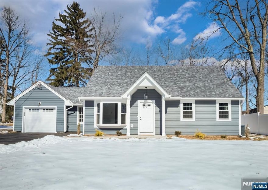 Welcome to this stunning, completely renovated Cape Cod home located in the heart of Wayne, NJ.This home has been meticulously gutted to the studs and thoughtfully customized with high-end craftsmanship throughout. Featuring 3 spacious bedrooms and 2.5 luxurious baths, this home is designed for both comfort and style.The primary bedroom is conveniently located on the first floor, offering a private en-suite bath & a generous walk-in closet. A beautifully designed 14x24 family room addition creates an open and airy space, perfect for entertaining, with seamless access to the patio and backyard for easy indoor-outdoor living.This home has been upgraded with all new electrical, a brand-new dormer, new windows, new Provia Cedar Mas Siding w/ foam backing, & doors,as well as a fresh 50 year shingle roof to ensure years of worry-free living.The multi-zone HVAC system, including central air, guarantees optimal comfort year-round.The insulation has been upgraded to include spray foam in the dormer ceiling, enhancing energy efficiency throughout the home. Step outside to enjoy the new driveway, landscaping, and insulated garage door. Inside, the entire home features new drywall and stylish laminate wood flooring, along with a tastefully selected kitchen and bathrooms that reflect both modern elegance and functionality.With its combination of updated systems, sophisticated design, & premium finishes, this home is a true masterpiece ready for you to move in and enjoy for years to come!