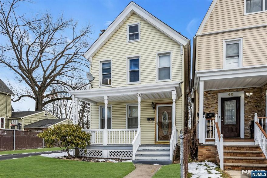 Lovely and Spacious Colonial Home offering a unique First Level Bedroom and Bath and a huge Detached 4 Car garage. This wonderful home is beautifully updated and is perfectly located near everything. The Main Level features a Charming Open Front Porch, a Cozy Living room with a Wood-Burning Fireplace with Built in Glass Door Shelves, a Ceiling Fan and Natural Trim, a true Formal Dining Room with a Beamed Ceiling and Newer Floors, an Ultra Modern Eat-in Kitchen with White Cabinets, Granite Counters, Recessed Lighting, a Large Pantry and a ceiling fan, an amply sized Bedroom with a Wall of Closets and a Ceiling Fan, an updated Full Bath and a convenient First Floor Laundry Area. Upstairs you will find the Primary Bedroom with a Natural Wood Beamed Ceiling and a Ceiling Fan, a Second Bedroom with a Double Closet and Ceiling Fan and a Second Updated Full Bath with a Stall Shower as well as a linen closet. This impeccable home also offers great curb appeal, a large level lot, an extra long driveway with Paver Curbing, Gas Hot Air Heat and a basement for additional storage space. The location is convenient to transportation, schools and shopping.