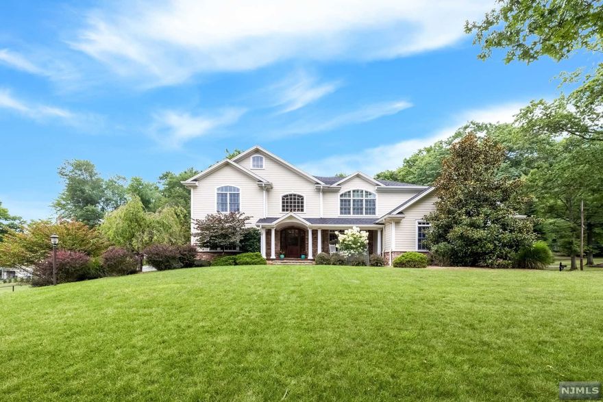 Custom built center hall colonial with attention to details throughout entire home. Hardy plank exterior. 1st floor boasts a beautiful 2 story entry foyer, guest room with en-suite w/full bath, and a stunning large white kitchen with farmers sink. High end appliances: Viking 6 burner stove and oven with warming drawer and mudroom off the kitchen. Second floor features Jack and Jill bedroom w/ fbth, En-suite w/ fBth and Primary bedroom offers a large custom walk in closet- Full custom bath with double vanity and shower-sleeping area with large window allowing natural- lighting. Lush backyard with large covered porch to enjoy evenings outside. Additionally, surround sound speakers on 1st level, master bedroom and bath, and covered porch. Blue Ribbon School