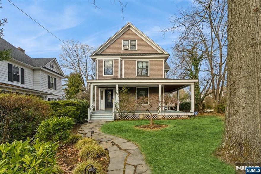 Location, Location, Location! Charming home located in the heart of Tenaflyâ€™s prestigious East Hill. This gem features a gorgeous wrap-around porch, original stained glass windows, hardwood floors, and intricate moldings, adding timeless character. The inviting foyer leads to an open-concept living and dining room, surrounded by large windows that fill the space with beautiful natural light. The true eat-in kitchen offers access to the outdoor deck, perfect for entertaining friends and family. The first floor also includes a full bathroom for added convenience. The second floor features three additional bedrooms, office space, and a bathroom with a stunning operational stained glass window. The third floor offers another bedroom and a bonus room. Full unfinished basement provides plenty of storage space. Unbeatable locationâ€”close to Blue Ribbon schools, the heart of town, houses of worship, and transportation to NYC. This home is not to be missed!