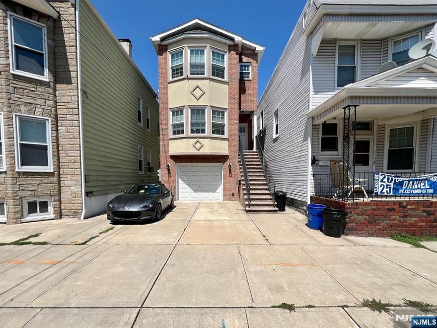 7-year old spacious bi-level apartment. 1st floor and ground floor used as one unit. Available to occupy on October 8th. Hardwood floors on 1st floor. Porcelain tiled floors & vinyl plank floors on ground floor. Kitchen with granite countertops and SS appliances. Finished ground floor with a large rec room, a bedroom, a laundry room and a full bath. Central air and forced hot-air heat. One garage plus a parking space outside the garage included. Tenant is responsible for removing the snow from the sidewalk and front steps, cut the grass and take out the garbage. Tenant pays all utilities except cold water. Washer & dryer provided. No Pets, no loud music and no smoking in or near the unit. Paver patio in yard. Within 14-minute walk to Harrison Path Station. Convenient to Turnpike, Parkway, Rt.280 & Rt. 21. Buses a block away. Application, tenant background check, good credit, and proof of ability to pay rent required.