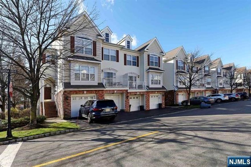 Two Bedroom Two and a half baths townhome at Boat works ,Living room with a fireplace and terrace, Dining area, Modern kitchen with stainless steel appliances and a half bath. The second floor has the master bedroom master bath. additional bedroom additional modern bathroom and laundry. the ground level has a family room with a door leading to the backyard area. One car attached garage and driveway. The complex has a swimming pool .great location very convenient to public transportation schools and shopping.