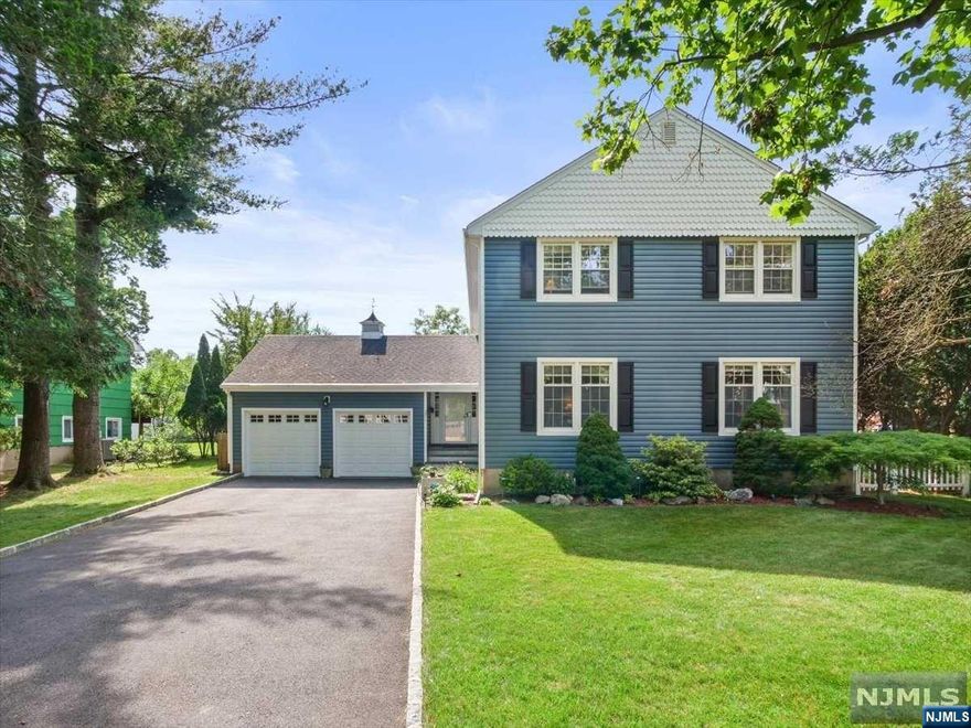 Situated on an ideal street in a charming neighborhood, this updated colonial boasts 4 BRs, 2.5 bathrooms, and is ready to move right in! The house captivates with its stately curb appeal, featuring a 2-car garage and newly renovated exterior. Upon entry, a spacious foyer leads to a bright LR adorned with new flooring, followed by a sizable dining area transitioning into a modern kitchen equipped with SS appliances and granite countertops, complemented by a cozy breakfast nook. Adjacent is a large family room and a convenient powder room. Upstairs, discover a grand primary suite w/en-suite full bath, along with 3 more generously sized BRs and a hall bath. The lower level surprises with additional living space, offering a recreational room and ample storage. Outside, a private flat yard and patio await, perfect for enjoying the warmer months. Don't miss out on this move-in-ready gem! WANT MORE INFO? CONTACT LISTING AGENT NICOLE MINETTI @ 201-388-0077 /nicole@minettidennisgroup.com