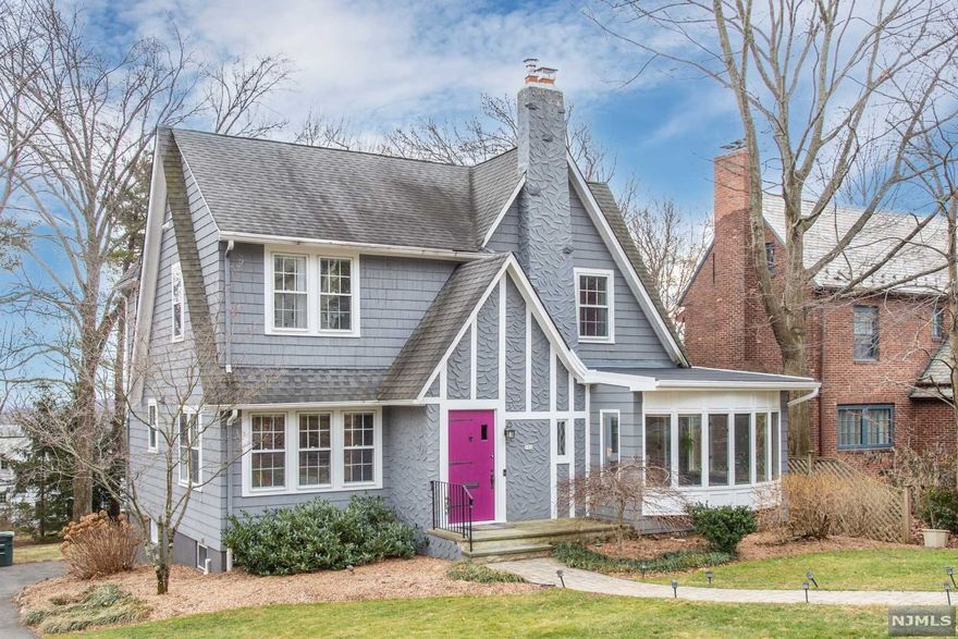 Pristine Sun drenched colonial tudor located on one of South Orange's loveliest streets. Open floor plan w/ an abundance of windows make this home extraordinarily bright and airy. Charming authentic details throughout include arched doorways, moldings, wood burning fireplace, hardwood floors and Updated features including master bed with ensuite full bath and full size laundry, 2 addt'l bedrooms and full bath complete the second level. Finished bsmt offers additional full bath and direct access to the garage. Spacious backyard can be accessed from the deck off the kitchen and bluestone patio is perfect for outdoor entertaining and recreational activities. Nearby schools, parks and shopping.