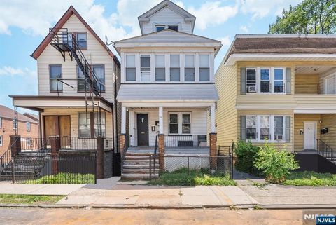 Photo of 134 Dewey Street, Newark, NJ 07112 (MLS # 25028879)