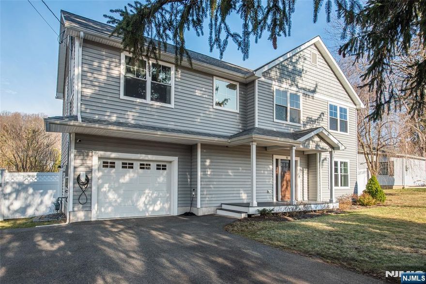 Rare move-in-ready opportunity in one of Denvilleâ€™s most sought-after neighborhoods. Renovated with a fresh, contemporary feel, this 4-bedroom Colonial offers the modern updates buyers are searching for in a market where homes like this are rarely available. Inside, high ceilings and luxury vinyl plank floors create a bright, open feel throughout the main living spaces. The white kitchen is designed for both style and function, featuring quartz countertops, clean modern finishes, and plenty of space for everyday living and entertaining. With 4 bedrooms, 2.5 baths, the layout offers flexibility for todayâ€™s lifestyle. Second floor laundry adds to the convenience. The primary bedroom has a walk-in closet and primary bathroom w/stall shower and double sinks. A one-car attached garage and an electric vehicle charging stationâ€”an increasingly valuable feature for modern homeowners. Step outside to a fully fenced backyard designed for relaxation and play. Enjoy gatherings under the large pergola on the paver patio while the playset creates a ready-made space for outdoor fun. The privacy fence adds both comfort and seclusion. Set on a quiet street in one of Morris Countyâ€™s most desirable townsâ€”known for its vibrant downtown, great restaurants, and commuter convenienceâ€”this home combines thoughtful updates with an unbeatable location. Inventory in Denville is limited, especially for renovated homes like this. Opportunity is knockingâ€”donâ€™t miss your chance to make it you