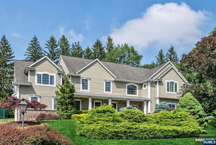 IMPECCABLE PICTURE PERFECT FARMHOUSE WITH COVERED LEMONADE PORCH. GRAND 2 STORY ENTRY FOYER WITH ELEGANT STAIRCASE. YOU WILL LOVE THIS OPEN FLOOR PLAN! LARGE GOURMET KITCHEN WITH BREAKFAST AREA, HIGH END APPLIANCES, DESK AND DOORS THAT LEAD TO LUSH PRIVATE PROPERTY AND NEW OUTDOOR KITCHEN AND FIRE PIT. HARDWOOD FLOORS, BANQUET SIZED DINING ROOM, GREAT ROOM WITH FIREPLACE & BAR. HIGH CEILINGS THROUGHOUT. 1ST FLOOR BEDROOM, FULL BATH, POWDER ROOM AND MUD ROOM. ON THE SECOND STORY YOU WILL FIND THE HUGE PRIMARY SUITE WITH SITTING AREA AND BONUS ROOM, TWO CUSTOM WALK-IN CLOSETS, LUX BATH WITH JETTED TUB, DUAL VANITIES. 3 GENEROUS SIZE BEDROOMS, ONE ENSUITE, 2 JACK & JILL. 2ND FLOOR LAUNDRY ROOM. FINISHED BASEMENT WITH GYM AREA, MEDIA ROOM AND GAME AREA. PLENTY OF STORAGE, CLOSETS GALORE, WHOLE HOUSE GENERATOR, SECURITY, CENT VAC, SPRINKLERS, GORGEOUS REAR YARD. 3 CAR OVER SIZED CUSTOM GARAGE. GORGEOUS TREE LINED STREET AND TREMENDOUS CURB APPEAL! SERENITY AND BEAUTY SURROUNDS YOU. COUNTRY LIVING AT ITS FINEST JUST 17 MILES FROM NYC! FREE BUSING TO TOP RATED SCHOOLS!!