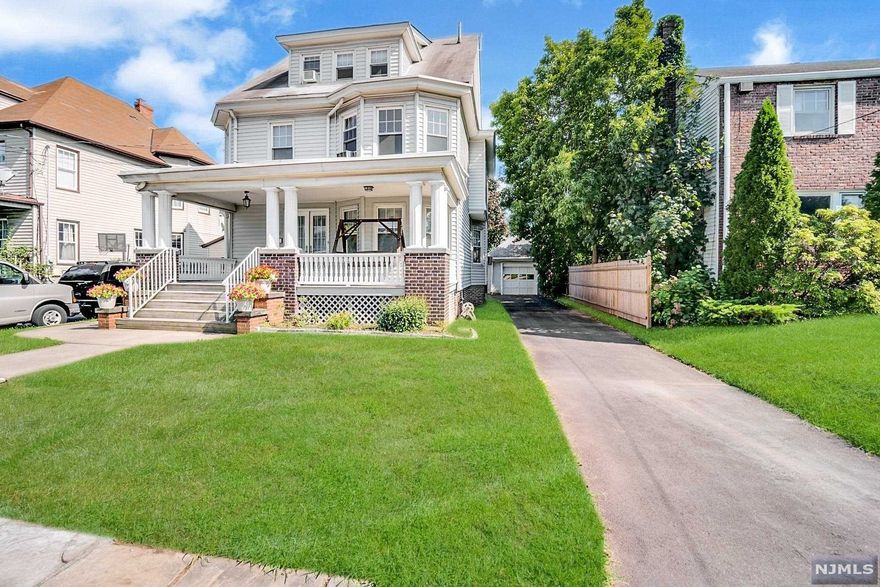 Located in Kearnyâ€™s Arlington "Manor Section" this 4 bedroom 1 1/2 bath side hall colonial with detached garage, long new driveway, open front porch, charm and elegance awaits you! 1st & 2nd floor feature 9' ceilings, lovely hardwood and parquet floor with gorgeous Oak and Chestnut trim/ woodwork. Kitchen w/Corian counter, ceramic tile backsplash, stainless steel appliances which include dishwasher (3 yrs old), refrigerator, stove (2 yr old), garbage disposal. Laundry rm on main level. Full unfinished basement. 2 zone Gas hot water baseboard heating system, 50 gallon gas hot water heater, 200 amp electrical service. Tiled bathrooms, main bath has heated floor, Lots of closet space. Includes 6 window unit air conditioners (each on its own breaker)blinds.3rd fl 4th bdrm, storage, 2 built-in cedar closets.Insulated home,copper plumbing,tilt out vinyl replacement widows, Mature landscaping. Garage has electric. Oil tank was removed. Short distance to New York city bus,schools & shop