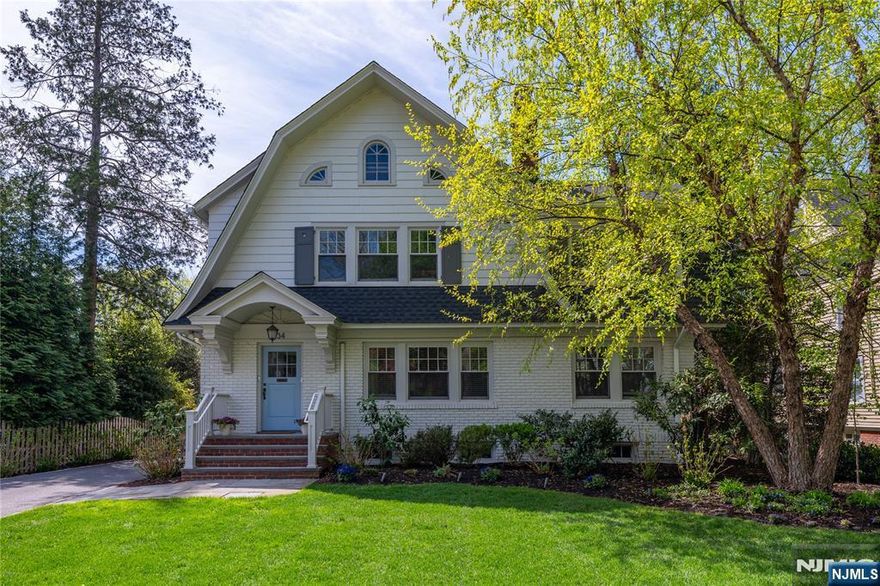 Welcome to a truly special home in the heart of Up Montclair. Set on a picturesque, tree-lined street, this well-maintained 2 family offers the space and feel of a single family, with the added benefit of rental income just 1 block to NYC train and bus. The upper residence spans the second and third floors, offering 4 beds and 2 full baths with a spacious layout ideal for everyday living and entertaining. High ceilings, hardwood floors, and abundant natural light highlight an extra-large living room with a wood-burning fireplace and beautiful built-ins, with an adjacent sunroom/office space. A spacious primary bedroom, formal dining room, and screened-in porch overlooking the yard add to the home's character. The updated kitchen features premium stainless steel appliances, while central air provides year-round comfort. The 3rd floor includes 2 bedrooms, a full bath, and an additional unfinished room ideal for an office or potential 5th bedroom. The 1st floor, 3 bed, 1 bath unit provides flexibility, with rental income of $4,056/month and the ability to occupy either unit or the whole house depending on your needs. The 1st floor space features hardwood floors, built-ins, and finishes consistent with the home's character. The property also includes a large unfinished basement, a 2-car garage, and added parking, offering enjoyment now and future potential. Close to shops, parks, and restaurants. Tenant-occupied; showings coordinated with notice. Photos reflect prior occupancy.