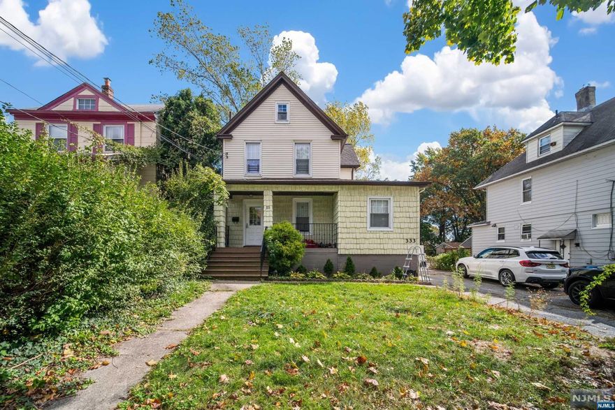 Incredibly bright 3 Bedroom house with a big back yard and rear porch! Central air! Open Kitchen! Good space with extra room in the attic and basement. Copious sunlight shining through the 1st floor. Massive Driveway! Come check it out!