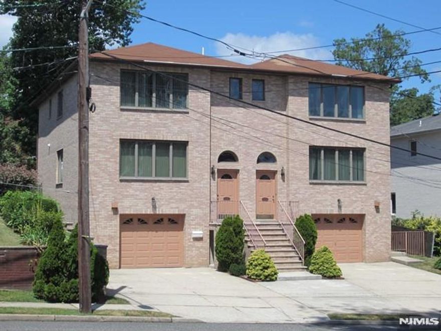 Very large Duplex house. Family Rm., Living Rm., Dinning Rm., Kitchen/Dinning/Glass door to Patio, 3.5 Bath Rms., One car garage, Two parking space, Fence-in back Yard. One Block from Fort Lee Sr.High School, less 5 minutes walking to George Washington Bridge, Linwood Ave NYC Express Bus Station to midtown and Shopping, less 10 minutes to #1 Elementary School. Owner pays Landscaping. Owner has Real Estate License.