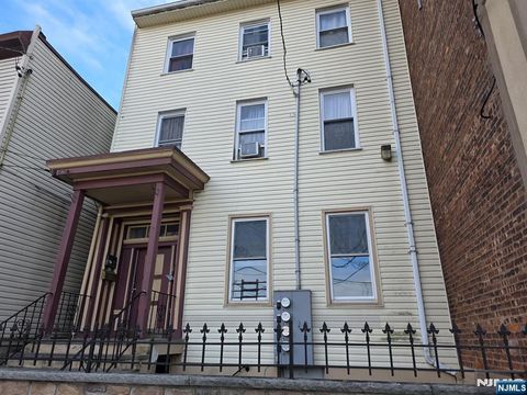 Photo of 32 Elm St, Paterson, NJ 07501 (MLS # 26000211)