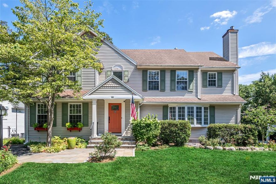 Move right in to this beautiful 5-bedroom, 3.5-bathroom center hall colonial located on a cul-de-sac in one of the most sought after neighborhoods in town. Loaded with natural light, the main floor offers wonderful flow and details throughout including a two story entrance foyer, large living room with gas fireplace and built-ins, den, first floor bedroom, updated bathroom, modern eat-in kitchen and a large dining area that opens to a recently renovated deck perfect for outdoor entertaining. The second floor offers a newly renovated hall bathroom, four generously sized bedrooms including a primary suite with high ceilings accented by reclaimed wood beams, a gas fireplace, spacious walk-in closet and spa-like bathroom. The fully finished walk out basement offers plenty of additional rec space, half bath and storage. Enjoy the very private backyard which features a gorgeous modern pool surrounded by lush gardens and mature landscaping. The home also includes a whole house generator. Close to top-rated town school, convenient to downtown and NYC transportation.