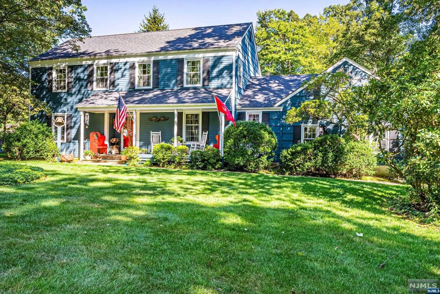 Welcome Home! Charming Colonial on over half an acre of beautifully landscaped level lot in the Coveted Millbrook Estate section of Randolph. Tons of curb appeal with Inviting Lemonade Front Porch! Move right in, STUNNING in-ground pool, separately fenced in to still enjoy yard space and deck/patio! Pride of ownership shines! Immaculately cared for by the same owners for years. Lots of Generous Room Sizes to Spread Out & Make Your Own! This 2,300 sq ft Home has a Comfortable, Spacious Floor Plan. Many Appealing Features Throughout. Gorgeous HW floors, wood beamed ceiling, moldings, chair rails, built ins, etc! 1st floor offers your classic & highly functional layout. Formal living room & dining room. The eat-in kitchen boasts your classic farmhouse feel with SS appliances and a slider to the back deck & yard. Cozy family room with a stunning WB fireplace. Convenient powder room & pantry closet. Laundry/mudroom off the garage entrance. Upstairs, 4 generous sized bdrms.