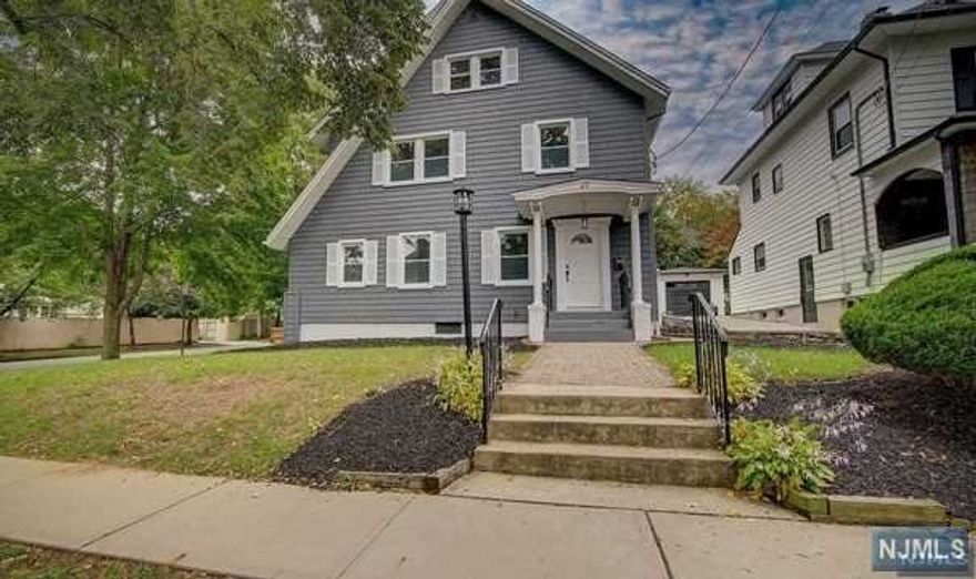 Nestled in this beautiful town, this remarkable residence offers luxurious features with superior craftsmanship in this new 2021 renovation. This corner property has 5 large bedrooms, 2.5 baths and over 3,000 sq ft including the finished basement. Upon entering, you will notice the gorgeous hardwood flooring and recessed lighting. Decorative brick wall with wood burning fireplace. Nice sized family room with large windows letting in lots of sunlight. Open kitchen and dining area with gorgeous light fixtures featuring beautiful center island with quartz counters and built in microwave. Top of the line two-tone custom cabinetry with marble backsplash, ceramic farm style sink and new SS appliances. Powder room and sunroom with backyard access round out the first floor. Second and third floors feature 5BR's & 2 baths and office space. Finished basement. Central air. One car detached garage.