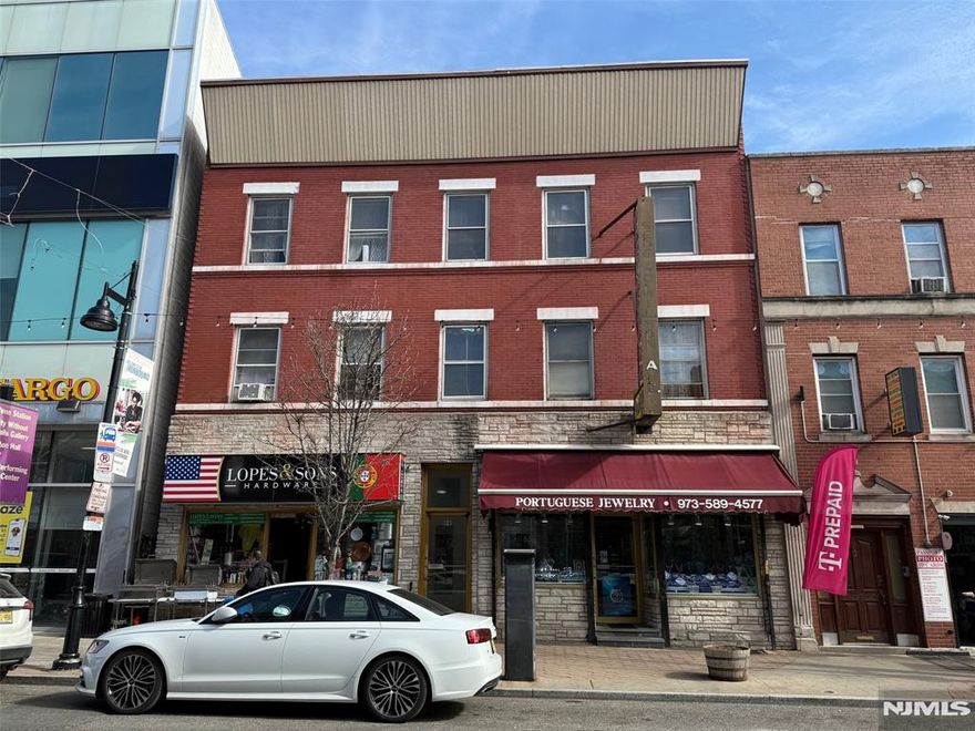 Ironbound - 10 Apartments and 2 Retail Stores (Hardware & Jewelry Store) - Value Add Property Featuring 3 - 1 Bedroom Apartments and 7 - 2 Bedroom (Rail Road Style) Apartments. All Residential Apartments are Below Market Value and Subject to Rent Control. All Tenants are Month to Month. Owner pays for Heat (Oil) and Hot Water for Entire Building. Each Store has Approximately 980 Sq. Ft. Three Story Building w/ Approximately 8,664 Sq. Ft. Built Around 1940 and Zoned C-2. Centrally Located and Minutes By Foot to Penn Station.