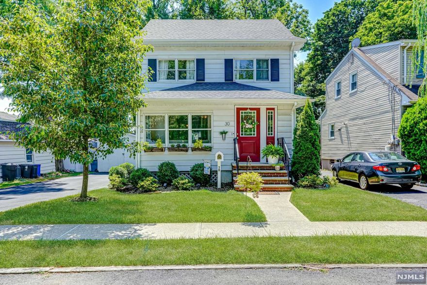 Impeccably maintained and fully updated 3 bedroom, 1 1/2 bathroom colonial on quiet residential side street in desirable Hawthorne. The main level features an incredible sunroom surrounded by windows, spacious dining room with open flow into the family room, powder room, and kitchen with granite countertops, stainless steel appliances, and bartop seating. Upstairs are three bedrooms and totally renovated full bathroom. The basement includes a large rec room, laundry area, and unfinished space for storage. The flat and private backyard is perfect for relaxation and entertaining with a large lawn, patio, and wooden deck. Across the street from beautifully maintained Goffle Brook Park with walking trails, playgrounds, and fishing ponds. With detached garage, brand new roof, freshly repaved driveway, electric car charger, one year homeowners warranty, and proximity to schools, train to NYC, and downtown this home is not to be missed!
