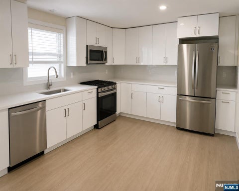 Photo of 35 Edsall AVE #2nd FL, Palisades Park, NJ 07650 (MLS # 26034996)