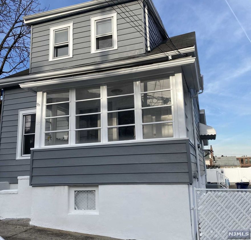 Lovely move-in ready 2 Family home. 2 Apartments. Bright floor plan w/new floors. Updated kitchen with, New APPLIANCES with Custom BUILT BATHROOM. New floors thought-out with New Light Fixtures .flows into a family room perfect for entertaining. 2 spacious bedrooms w/ nice size closets & 1 full bath on each floor. The PAR finished bsmnt holds the utilities, storage room, Entertainment room and extra room for gaming. Sizeable driveway opens into a amazing bckyrd. Hurry this wont last easy showing. Seller Concession Is Ok !!! Stop Paying rent !!! BUY Your Own Home Today...