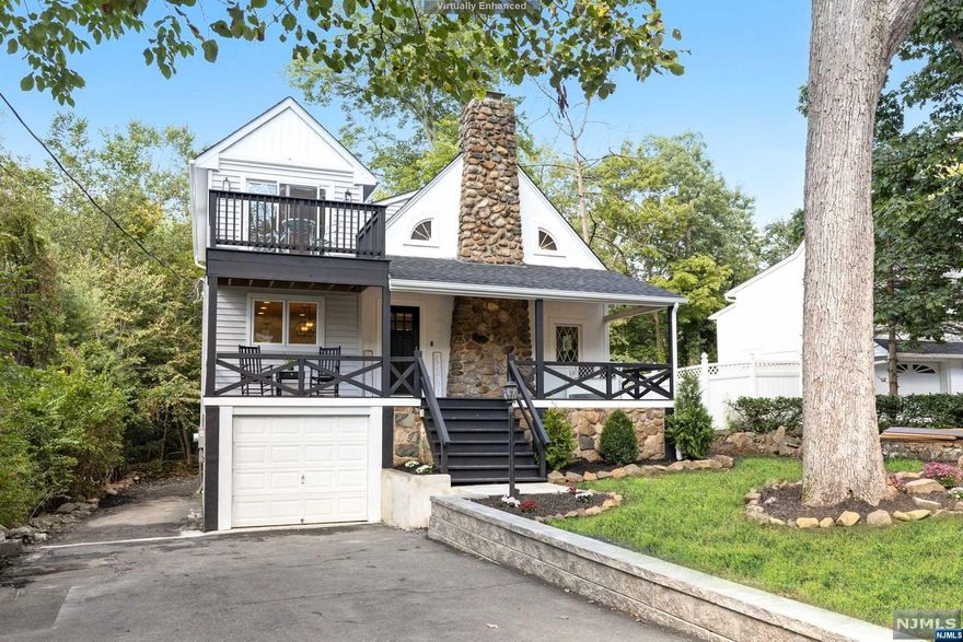 Smart home luxury living meets the serene beauty of Packanack Lake, welcome home to 8 Mountainside Dr! You'll be captivated by cathedral ceilings & stone fireplace w/ original charm. Completed Renovated & transformed from top to bottom w/ meticulous attention to detail & high-end finishes. The interior showcases are large and spacious brand new custom master chef style kitchen w/ farmhouse sink, huge quartz center island w/ breakfast bar, gold accents, all custom designed cabinets & separate pantry w/ beautiful barndoor. 1st-floor bedroom suite is a sanctuary w/ a smart de-steam lighting mirror, rain showerhead, & full-body spray. Upstairs, 3 spacious bedrooms w/ double closets, full bath w/ daul sinks, 2nd fl sun deck providing mesmerizing winter lake views. Close to NYC trans & just minutes from WAYNE Transit Center, shopping, food, and more!