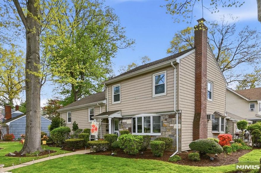 Welcome Home! Set back amid manicured landscaping This Split-level home offers exceptional curb appeal, sitting on a 100x113 level corner lot. This inviting 4-bedroom 3-bath home offers the perfect blend of comfort, character, and location. The spacious Sun-drenched living rm offers a gas fireplace Hardwood floors flow effortlessly into the dining rm. Modern Kitchen with newer stainless appliances, granite countertops. 2nd level offers original primary bedroom w/bath, Bedroom, Bedroom and main bath. 3rd level offers an expanded Primary Suite with Full Bath, Walk in Closet. Lower level offers family room, laundry room 1/2/bath and a workshop Enjoy quiet mornings or cozy evenings in the Sunroom a true extension of the living space that brings the outdoors in. Step out onto your patio perfect for entertaining amidst beautifully landscaped surroundings. An oasis for entertaining and relaxation. The fenced backyard is ideal for pets and offers space to garden, Attached is an oversized garage.