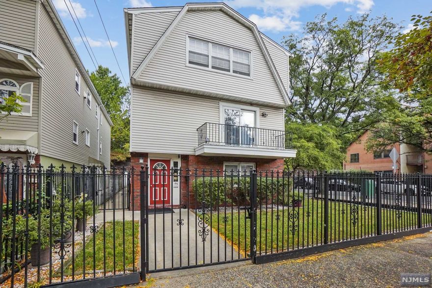 You don't want to miss the oversized Corner lot Two-Family property in Downtown Jersey City! The open concept living room/ dining room connects to a spacious eat-in-kitchen. Find three large bedrooms and two baths in each unit. . The ground floor includes a laundry space and bonus spaces for recreational use- Possible 3 family w/ proper city approval. The exterior features an attached Garage w/ ample parking! Close to Hamilton park and Grove St. Path station. NY commuters Dream!