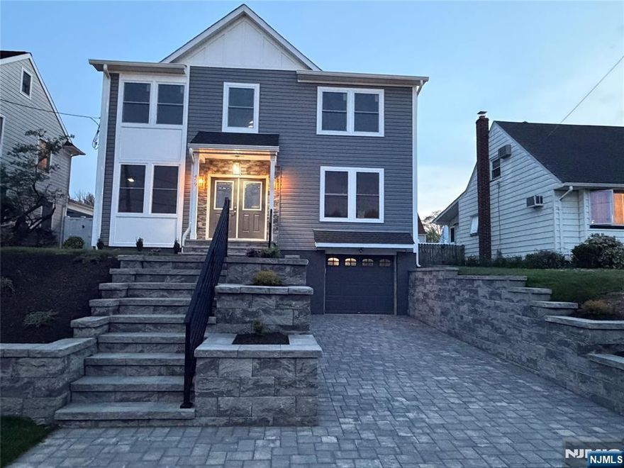 Luxury new construction on existing foundation in a prime location. This move-in-ready 5-bedroom, 4 full-bath home sits on one of the nicest streets in town, directly across from a park and in a top-rated school district. Designed for both comfort and style, the home features nearly 9â€™ ceilings on the first floor and 8â€™ ceilings on the second, creating a bright, open feel throughout. The spacious eat-in kitchen with high-end appliances flows seamlessly into the main living areas, making it ideal for everyday living and entertaining.Upstairs offers the convenience of a second-floor laundry and a luxurious primary suite with a soaking tub, perfect for unwinding at the end of the day. A 3-zone HVAC system ensures year-round comfort.Step outside to a covered patio, ideal for relaxing or hosting guests, along with a 4-zone underground sprinkler system that keeps the property looking its best with minimal effort.
