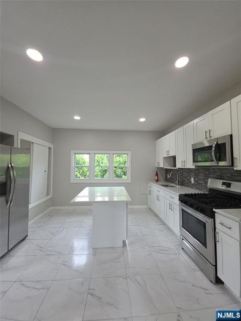 Photo of 143 Wabash Ave, Paterson, NJ 07503 (MLS # 26015762)