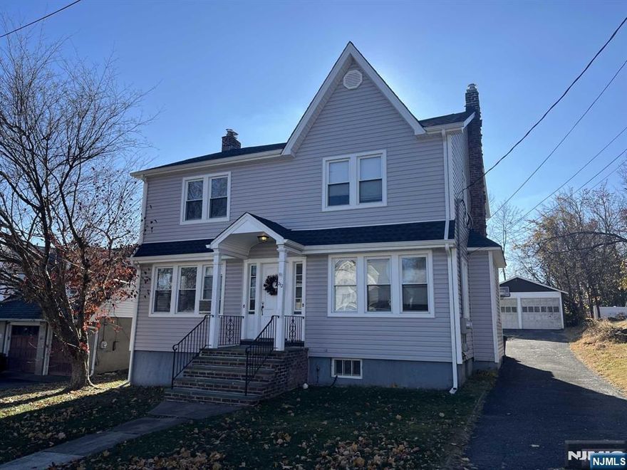 Located in the heart of downtown Ridgewood, this beautifully finished 1/2 duplex offers the perfect blend of comfort and convenience. The home features neutral paint tones and stunning hardwood floors throughout, creating a bright and inviting atmosphere. A spacious family room flows into a sun-filled living room, highlighted by a recently converted gas fireplace, ideal for relaxing or entertaining. The eat-in kitchen provides both functionality and style, perfect for everyday living. Upstairs, two generously sized bedrooms offer walk-in closets and share a full hall bathroom, providing both comfort and privacy. The home also includes a separate, unfinished lower level, ideal for laundry and additional storage. Enjoy close proximity to Ridgewoodâ€™s vibrant downtown, including shops, restaurants, and transportation.