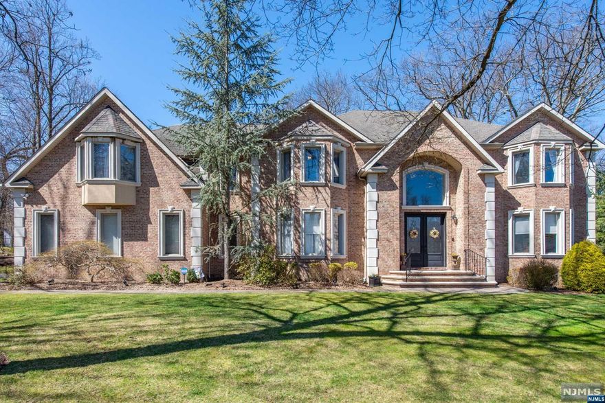 Elegant 5 BR,5 BA Colonial Manor home set majestically on a quiet cul-de-sac in USR! You will be WOWED from the moment you pull up to & open the front door to the dramatic 2-Story Entry W/impressive LR to the right & Banquet-sized DR to the left.The STUNNING Eat-In Chef's Kitchen has high end SS appliances,granite counter tops,massive seated island,Butler Pantry, and Pantry open to FABULOUS vaulted Great Rm W/FPL/Wall Of Windows! An office,FB,Lndry,& Back Staircase complete this flr.This spacious open flr plan boasts high end appointments including custom millwork,9'ceilings(1st flr), & hardwd flrs..perfect for everyday living & entertaining.Upper level LUX Primary Suite w/spa bth & 3 WIC's,2 J&J BR's,BR/BA,& BR.The Backyard is your own private oasis W/beautiful patio & in-ground pool!Plenty of green space for outdoor activities!Enjoy the peace & tranquility of this exquisitely landscaped property.Huge Rec Rm in basement W/FB & plenty of storage.3 Car garage.Outstanding Schools!