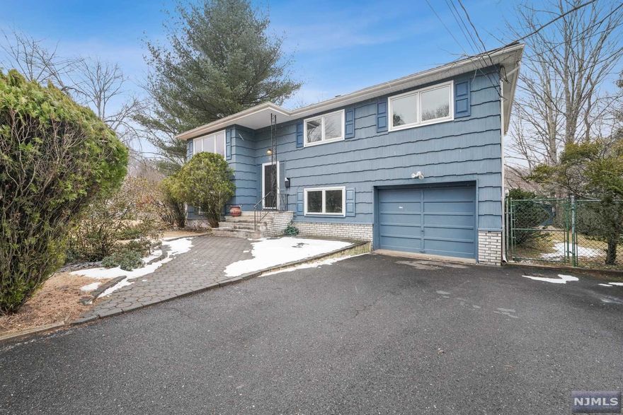 Renovated Bi-Level home in Waldwick's coveted school district. This home includes three bedrooms with a bonus room in the lower level that can be used as a fourth bedroom or private home office. Home has central air! Possibility for future expansion as the home is located on a beautiful nearly half an acre property. Quiet setting yet close to so much with town pool and park, NYC train and more with a nice community vibe. A fine home in a great town. Sold AS-IS.